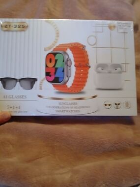 ZT-325 electronics gift bundle containing a smartwatch, earbuds, AI sunglasses